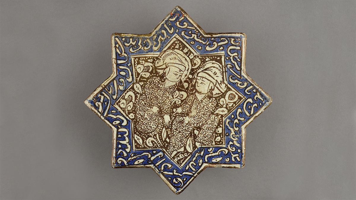 Tile in star form with lustre-painted design of two figures wearing owl-feather hats